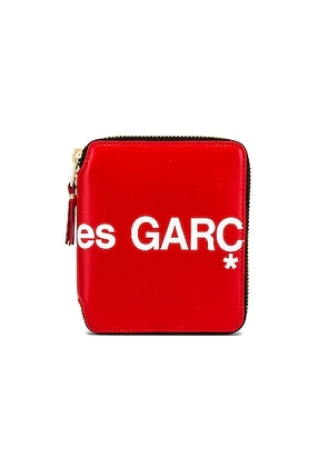 COMME des GARCONS Huge Logo Wallet in Red - Red. Size all.