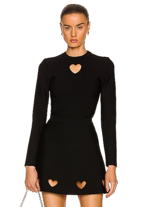 ALAÏA Cutout Heart Long Sleeve Top in Noir - Black. Size 34 (also in ).