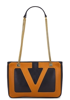 Valentino Garavani Viva Superstar Small Tote Bag in Nero & Spice - Black. Size all.