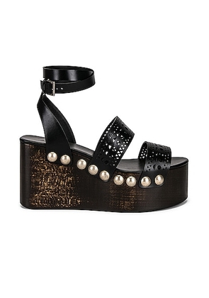 ALAÏA Vienne Wooden Ankle Strap Wedges in Noir - Black. Size 38 (also in 39, 40, 41).