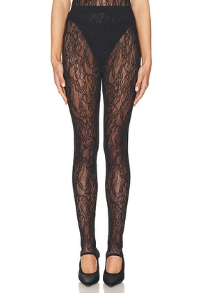WARDROBE.NYC Lace Stirrup Legging in Black - Black. Size L (also in M, S, XL, XS, XXS).