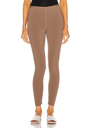 ALAÏA Stretch Legging in Savanne - Brown. Size 38 (also in 36).