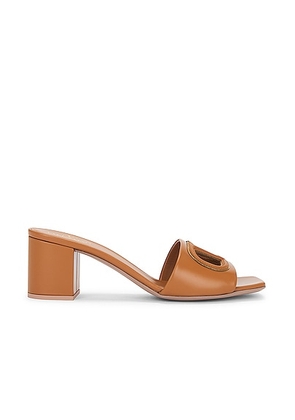 Valentino Garavani V Logo Cut Out Mule in Almond Beige & Antique Brass - Beige. Size 36.5 (also in 37, 39, 39.5, 41).