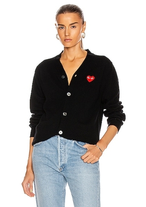 COMME des GARCONS PLAY Wool Red Heart Emblem Cardigan in Black - Black. Size XS (also in L, M, S, XL).