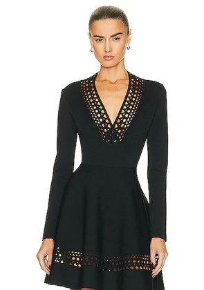 ALAÏA Vienne V-neck Bodysuit in Noir ALAÏA - Black. Size 38 (also in 40, 44).