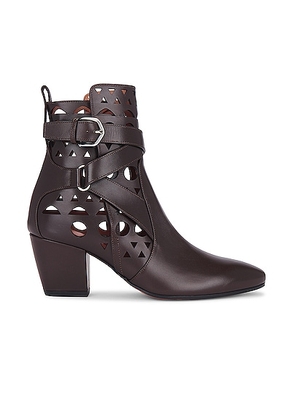 ALAÏA Perforated Ankle Boot in Marron Fonce - Brown. Size 36.5 (also in 36, 38.5, 39).