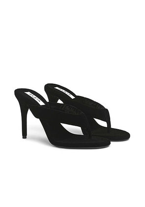 ALAÏA Thong Mule in Noir - Black. Size 36 (also in 38, 39, 40).