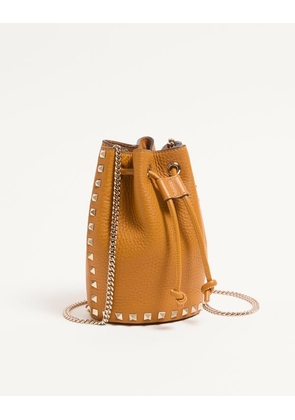 Valentino Garavani Mini Rockstud bucket bag in grainy calfskin Woman GOLDEN CUIR UNI