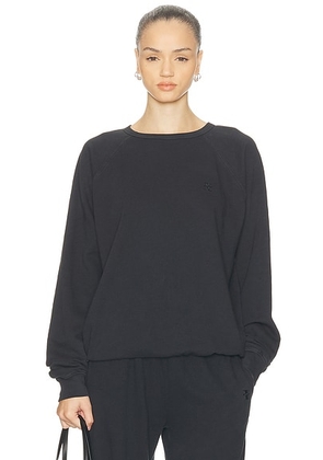 Eterne Oversized Lightweight French Terry Raglan Sweatshirt in Faded Black - Black. Size M (also in L, XL, XS).