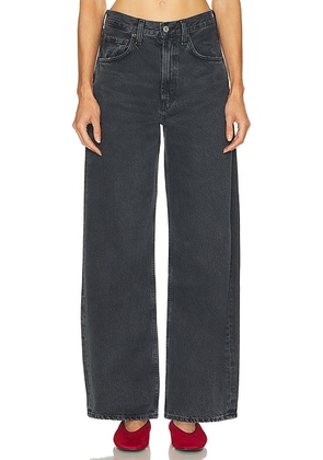 AGOLDE Low Curve Jeans in Symbolic - Black. Size 24 (also in 23, 25, 26, 27, 30, 32, 33, 34).