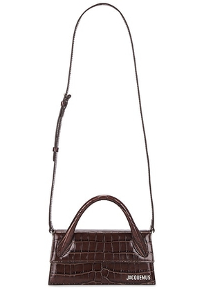 JACQUEMUS Le Chiquito Long in Dark Brown - Brown. Size all.