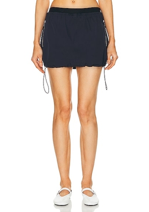 GRLFRND Cinched Mini Skirt in Navy - Navy. Size XS (also in ).