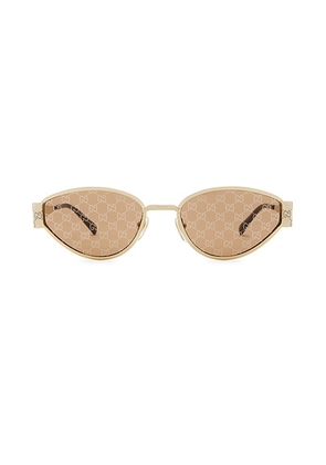 Gucci Oval Sunglasses in Gold & Brown - Metallic Gold. Size all.