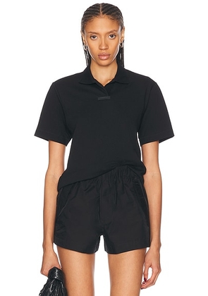 Fear of God ESSENTIALS Short Sleeve Polo Top in Black - Black. Size L (also in S, XS).