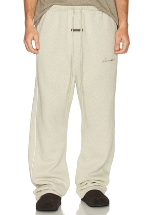 Fear of God ESSENTIALS Relaxed Fleece Sweatpant With Piping in Heather Stone & Cloud White - Grey. Size L (also in ).