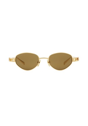 Gucci Oval Sunglasses in Gold & Bronze - Metallic Gold. Size all.