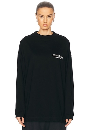 Fear of God ESSENTIALS Jersey Long Sleeve T-Shirt in Black - Black. Size L (also in M, S, XL/1X, XXL/2X).