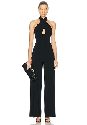 Norma Kamali Cross Halter Straight Leg Jumpsuit in Black - Black. Size L (also in S, XL).