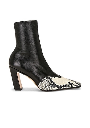 KHAITE Nevada Ankle Stretch Boot in Black & Natural - Black. Size 36 (also in ).