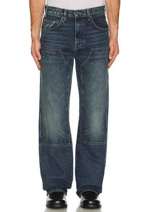 NILI LOTAN Matteo Welder Jeans in Simon Wash - Blue. Size 33 (also in 32).