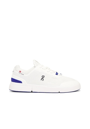On The Roger Spin Sneaker in White & Indigo - White. Size 12 (also in 11.5, 12.5, 7).