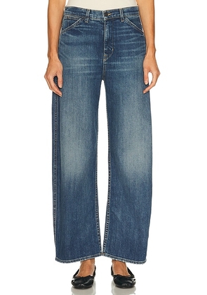NILI LOTAN Tribeca Curved Leg in Classic Wash - Blue. Size 27 (also in 26, 29, 31).