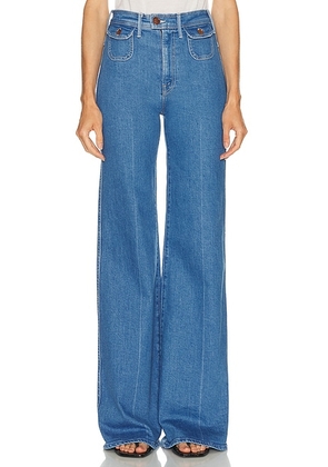 MOTHER The Pocketbook Hustler Roller Heel Jeans in This Is Just My Day Job - Blue. Size 30 (also in 28, 32).
