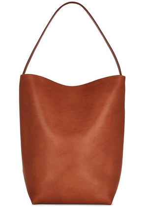 The Row Large N/S Park Tote Bag in Dark Cuir PLD - Brown. Size all.