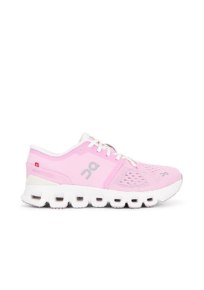 On Cloud X 4 Sneaker in Petal & Sand - Pink. Size 10 (also in 5, 5.5, 6, 6.5, 7, 7.5, 8, 8.5, 9, 9.5).