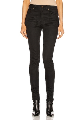 Saint Laurent Medium Waist Skinny Jeans in Used Black - Black. Size 24 (also in 25, 26, 28).
