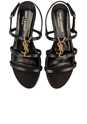 Saint Laurent Cassandra Leather Flat Sandals in Nero - Black. Size 40.5 (also in 36).