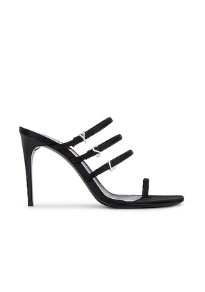 Saint Laurent Jerry Mule Sandal in Noir - Black. Size 36.5 (also in 36, 37, 37.5, 38, 38.5, 39, 39.5, 40, 41).