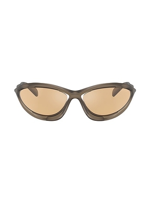 Prada Oval Sunglasses in Brown - Brown. Size all.