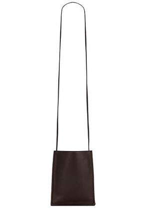 The Row Small To Go Crossbody Bag in Dark Brown ANS - Brown. Size all.