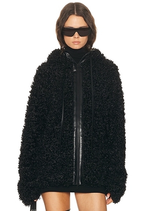 Norma Kamali Oversized Raglan Sleeve Zip Front Hooded Jacket in Black - Black. Size M (also in S).