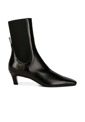 Toteme The Mid Heel Boot in Black - Black. Size 35 (also in 36, 38, 41).