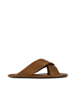 Saint Laurent Talha Flat Sandal in Dark Macadamia - Brown. Size 37.5 (also in 36, 36.5, 37, 38, 38.5, 39, 39.5, 40, 41, 42).