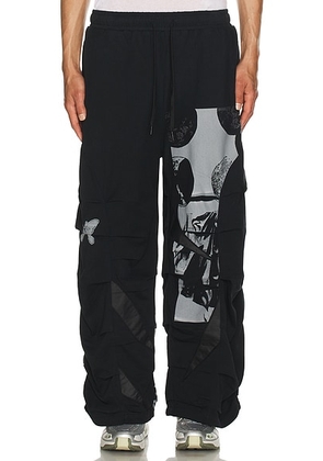 P.A.M. Perks and Mini Equinox Flower Pants in Black - Black. Size M (also in ).