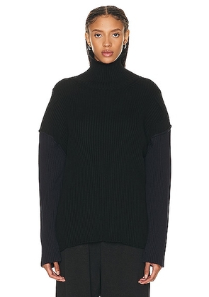 The Row Dua Sweater in Black & Navy - Black. Size M (also in L, XS).