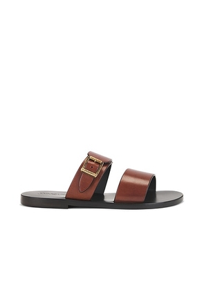 Saint Laurent Pepe Slide Sandal in Bruciato - Brown. Size 36.5 (also in 36, 37, 37.5, 38, 38.5, 39, 39.5, 40).