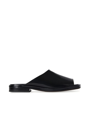The Row Emi Mule Sandal in Black - Black. Size 36.5 (also in 37, 37.5, 38, 39, 39.5).