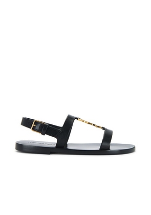 Saint Laurent Cassandra Flat Sandal in Nero - Black. Size 36.5 (also in 36, 37, 37.5, 38, 38.5, 39, 40).