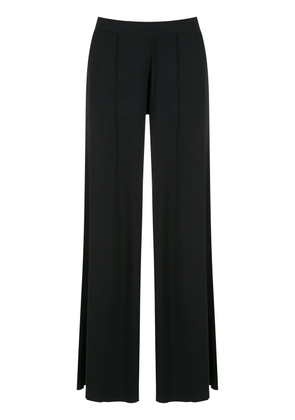 Lygia & Nanny flared pleated trousers - Black