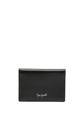 Discord Yohji Yamamoto logo-print bi-fold leather wallet - Black