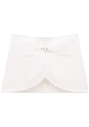 Courrèges Ellipse buckled curved miniskirt - White