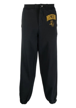 Moschino logo-print cotton sweatpants - Black
