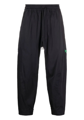 Y-3 logo-print tapered track pants - Black