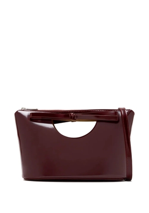 Studio Amelia bow-detail cut-out clutch bag - Red