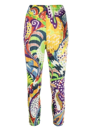 Pleats Please Issey Miyake Snowrunner graphic-print pleated trousers - White