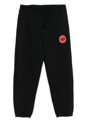 HUGO logo-print track pants - Black